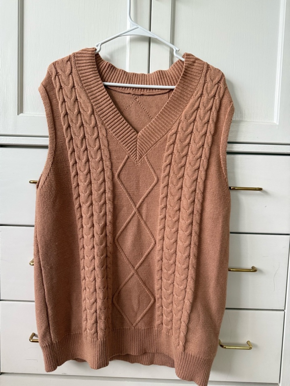 Tan cable V neck sweater vest.